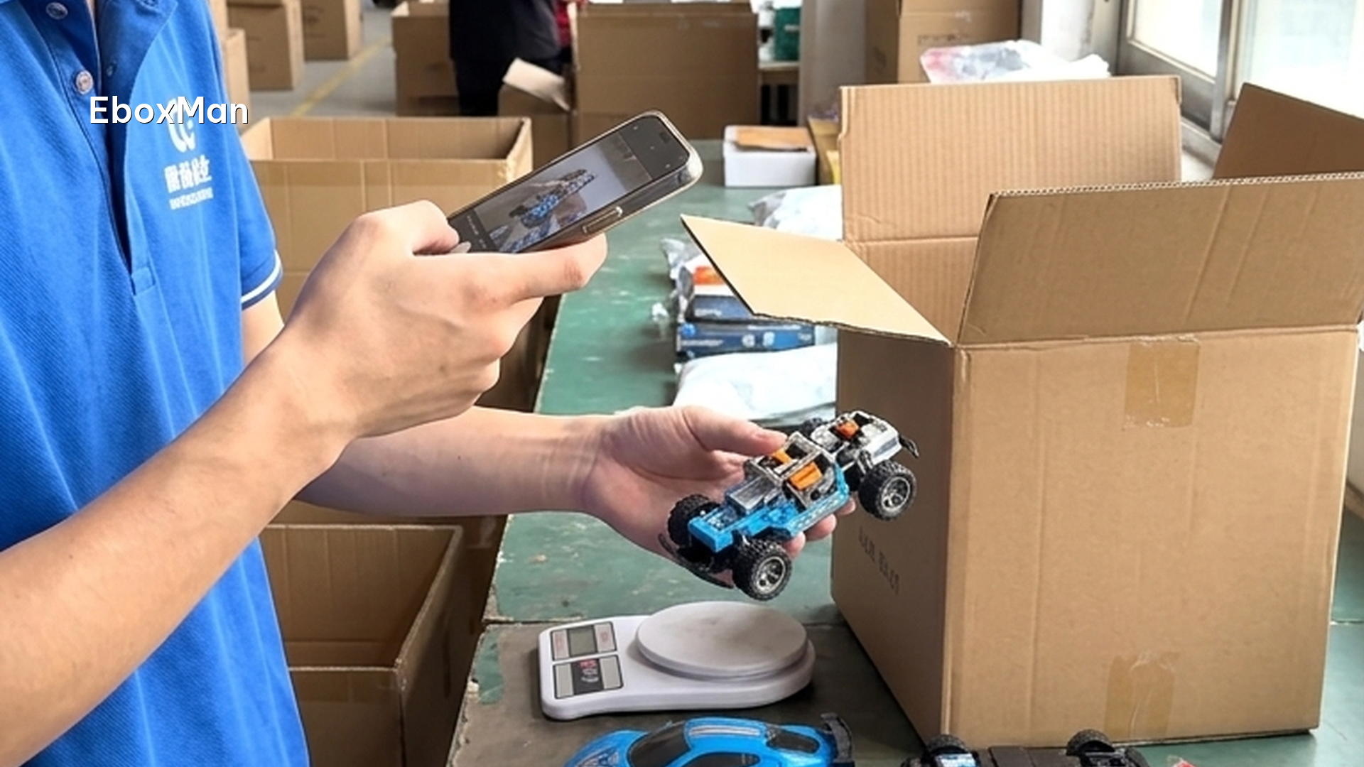 QC inspector photographing products before dispatch at a China warehouse