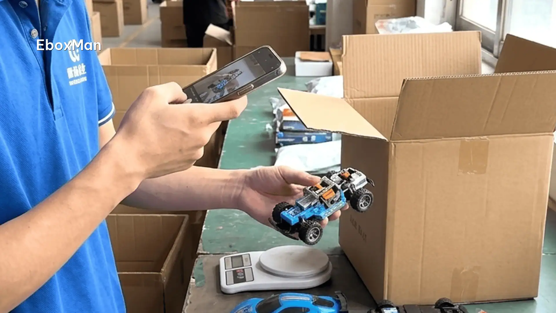 QC inspector photographing products before dispatch at a China warehouse