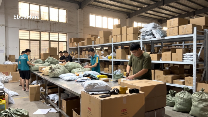 Warehouse staff packing dropshipping orders in a China fulfillment center