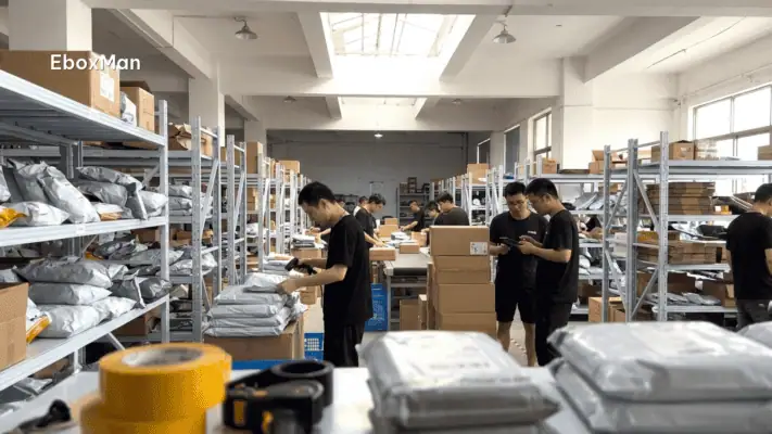 Warehouse staff scanning dropshipping parcels before shipping