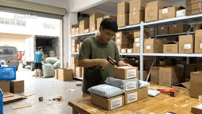 Warehouse worker scanning parcels bound for the UK and EU