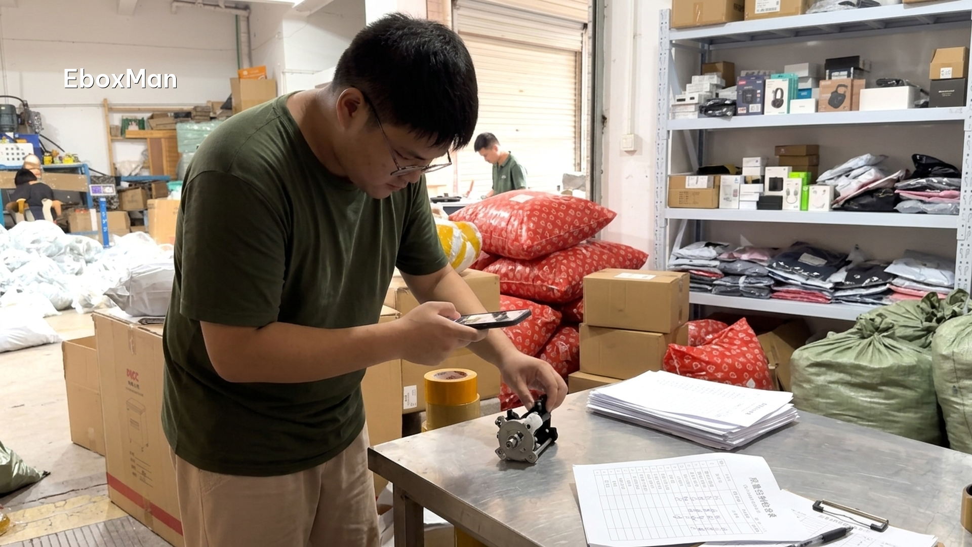 QC inspector photographing a product batch before dispatch