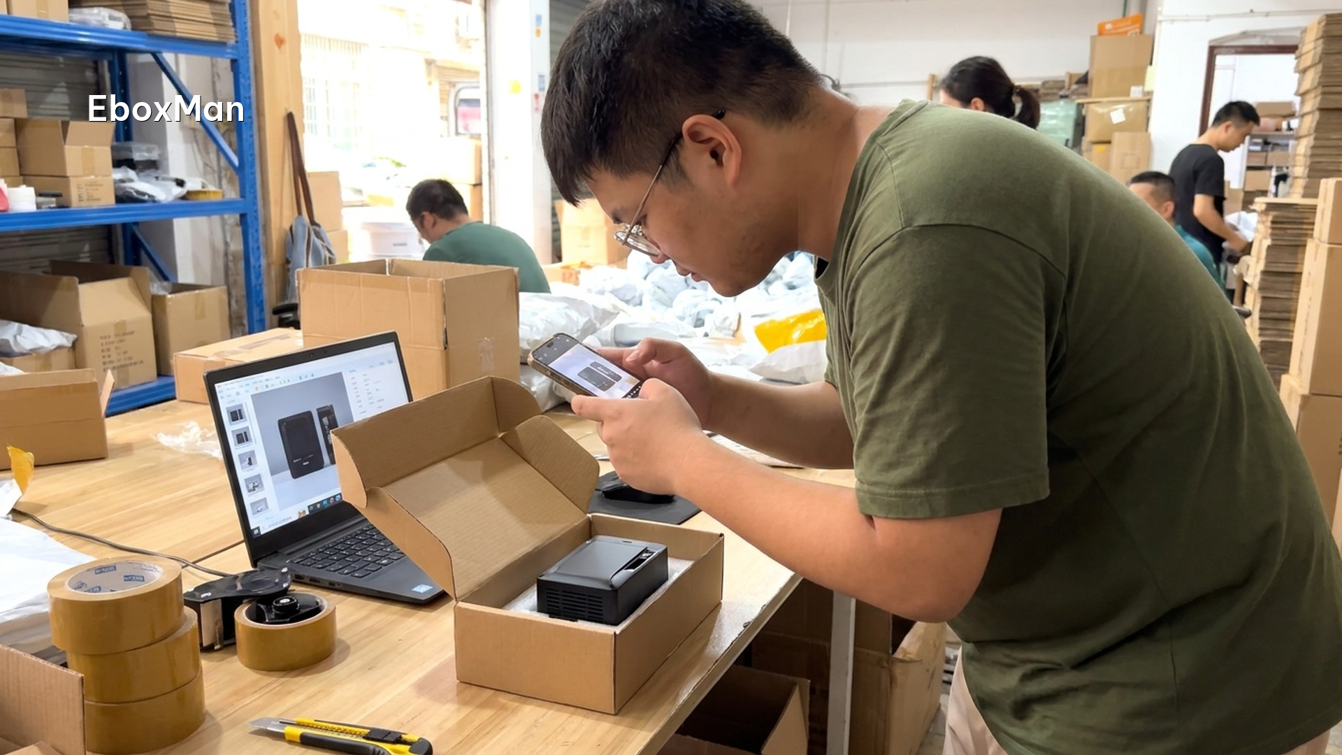 QC desk photographing a product batch before shipping