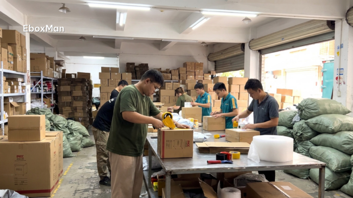 Warehouse staff packing dropshipping orders in China