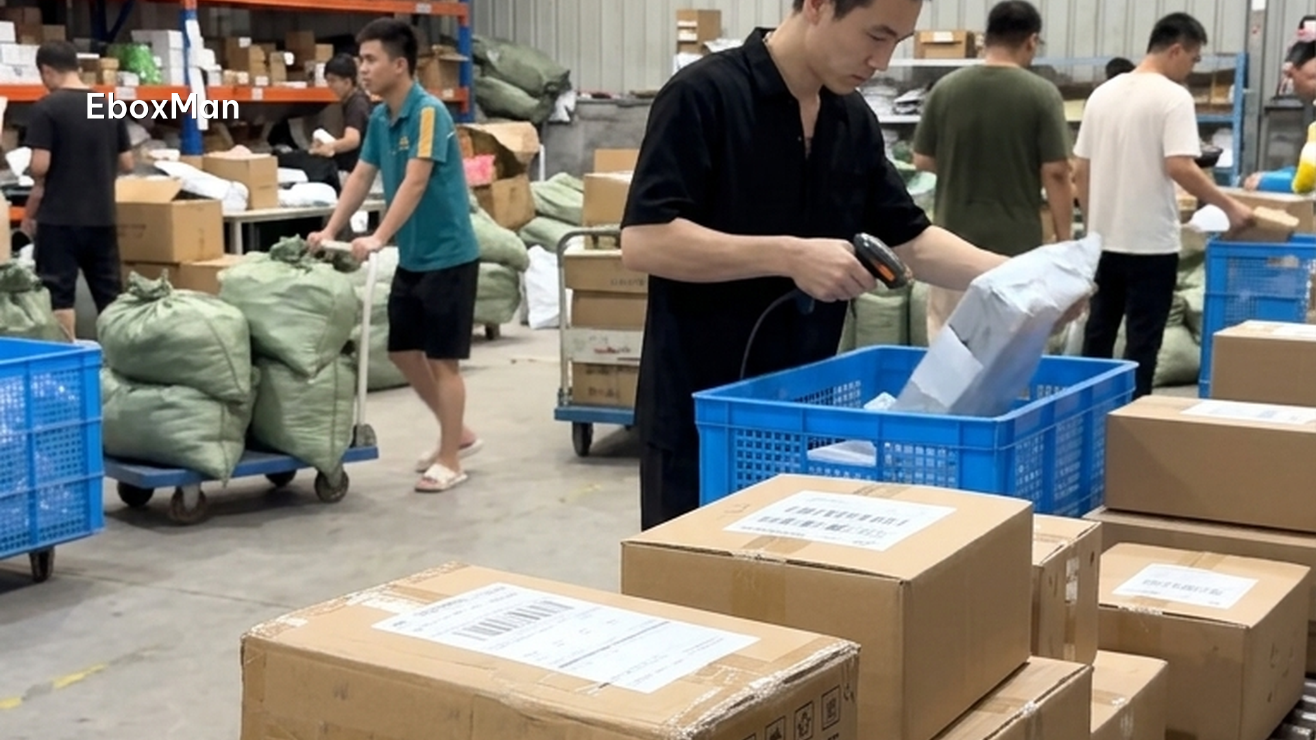 Labeled parcels moving through a logistics facility before international shipping