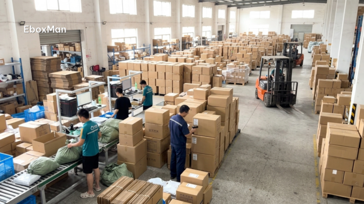 Chinese warehouse staff scanning parcels before shipment
