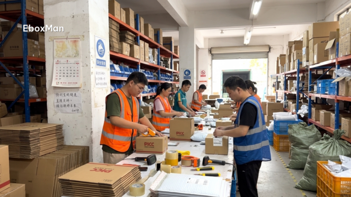 Warehouse staff in China packing branded private label boxes ahead of the holiday season